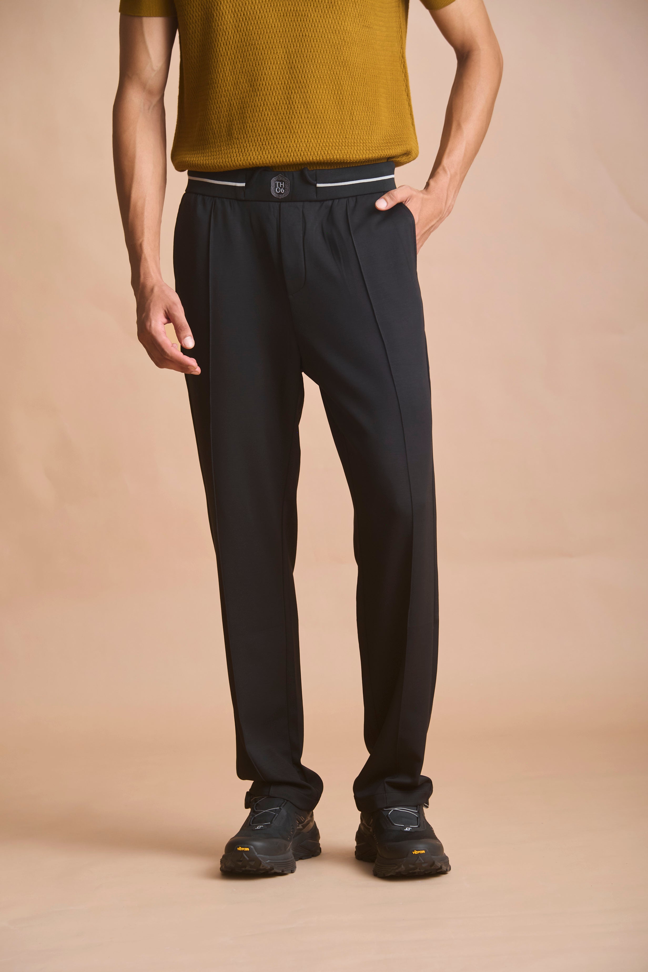Black leisure trousers with white tipping stripes in 80% lyocell, 13% polyester, 7% spandex | House of 6
