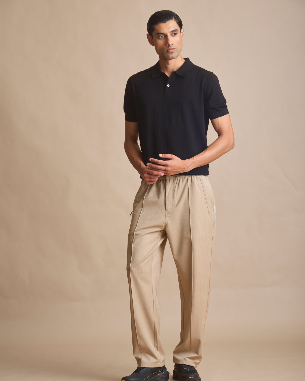 Midnight black vertical textured knit polo in 100% Australian merino | House of 6